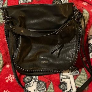 Jessica Simpson shoulder or crossbody bag.  It has handles for both.